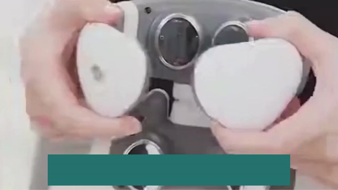 A video showing a demonstration of how a white 4D neck massager works.